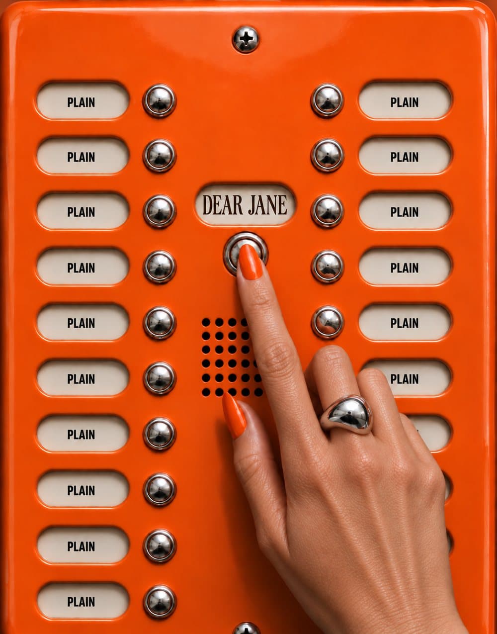 A hand with orange nails presses the Dear Jane buzzer on an orange panel where every other name reads Plain